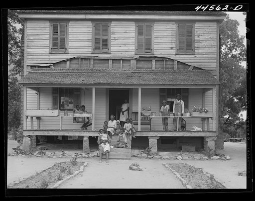 Untitled photo, possibly related to: An old plantation house now occupied by a Negro FSA (Farm Security Administration) family. Greene County, Georgia