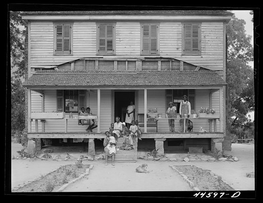 An old plantation house now occupied by a Negro FSA (Farm Security Administration) family. Greene County, Georgia
