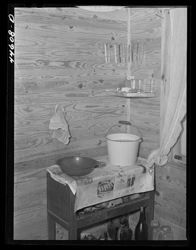 Toothbrush corner in the home of Mr. Robert McWhorter, Negro tenant purchase FSA (Farm Security Administration) client. Woodville, Greene County, Georgia