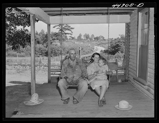 A tenant purchase FSA (Farm Security Administration) borrower, his wife, and one of their children at their home in southern Greene County, Georgia