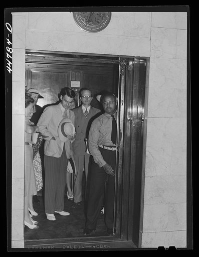 Untitled photo, possibly related to: Elevator operator in the Barr Building. Washington, D.C.