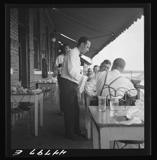 Untitled photo, possibly related to: Negro waiter in Hertzog's, seafood restaurant along the waterfront. Washington, D.C.