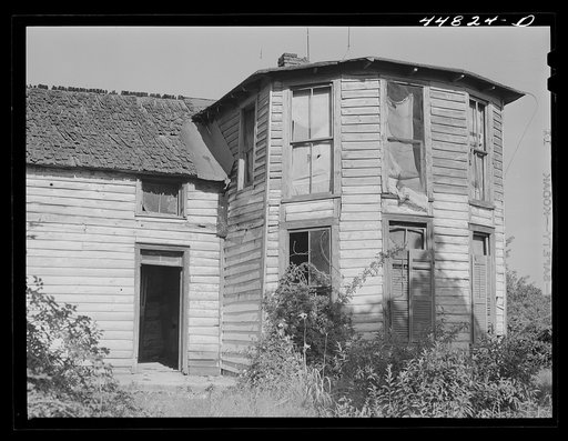 This house was evacuated by a Negro tenant family who moved into one of the prefabricated houses built by FSA (Farm Security Administration). Caroline County, Virginia