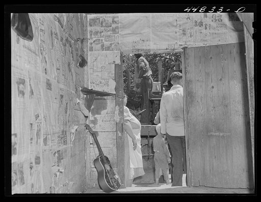 Mrs. Russell Tombs and her family moving out of the area being taken over by the Army in Caroline County, Virginia