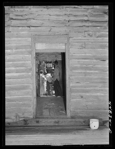 Mrs. Russell Tombs and her family moving out of the area being taken over by the Army in Caroline County, Virginia