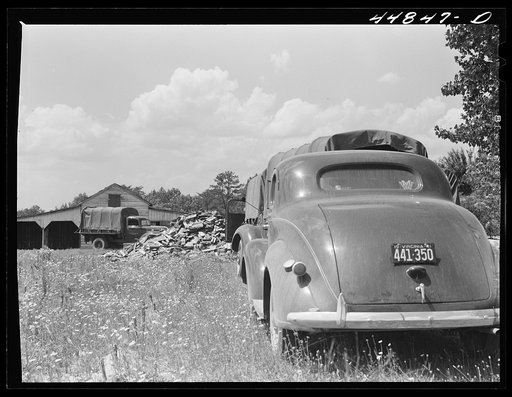 CCC (Civilian Conservation Corps) boys and trucks were used to help some of the families move out of the area being taken over by the Army in Caroline County, Virginia