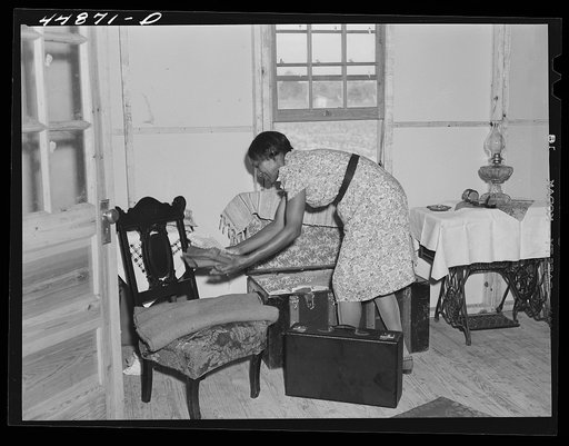 Untitled photo, possibly related to: This young woman and her family moved from the area taken over by the Army to a prefabricated house built by FSA (Farm Security Administration) to take care of some of the farmers who had to move. Milford, Caroline County, Virginia