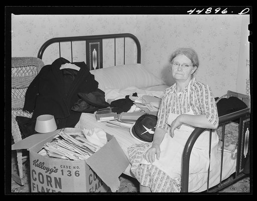 This woman is packing her belongings and getting ready to move out of the area taken over by the Army in Caroline County, Virginia
