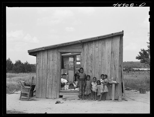 Untitled photo, possibly related to: Ten people live in this shack. They must move to make way for the Army maneuver grounds. Caroline County, Virginia