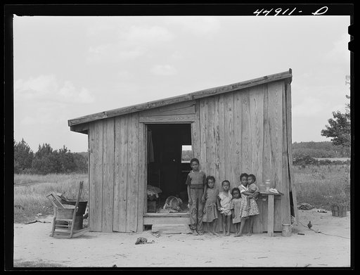Untitled photo, possibly related to: Ten people live in this shack. They must move to make way for the Army maneuver grounds. Caroline County, Virginia