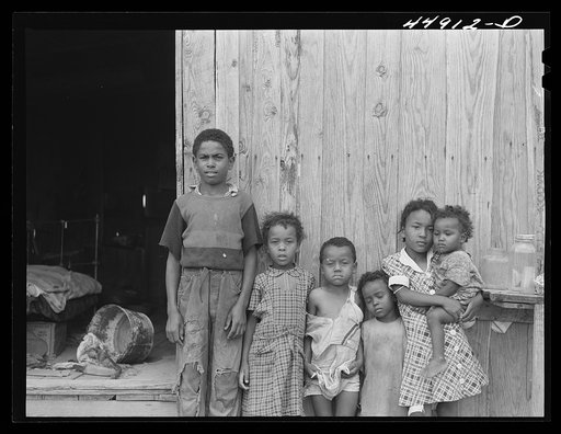 Some of the children of a family of ten who must move out of the area being taken over by the Army in Caroline County, Virginia