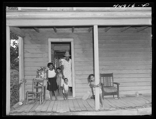 Untitled photo, possibly related to: This family moved out of an Army area in Caroline County that had to be evacuated by June. Now they are in an area that must be evacuated by September, and so are planning to move again. Caroline County, Virginia