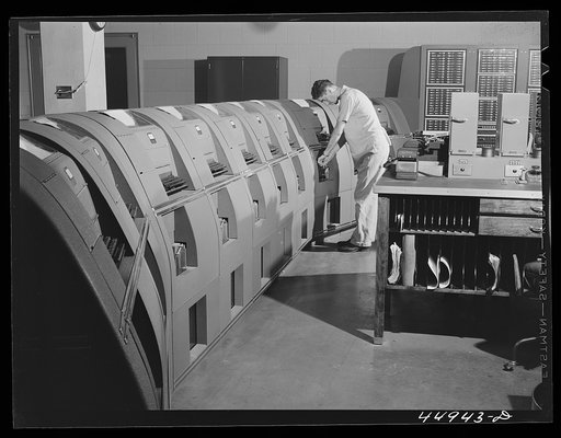 In the teletype room, where weather data and other information is constantly being received. Municipal airport, Washington, D.C.