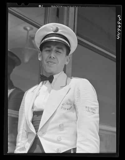 Untitled photo, possibly related to: One of the airlines uses stewards, the other two use hostesses. Municipal airport, Washington, D.C.