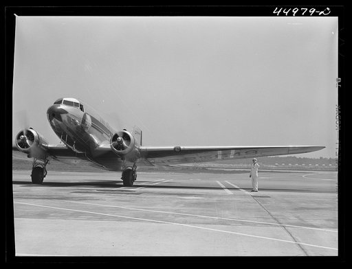 An airliner arriving and taxiing into position. Washington D.C. municipal airport