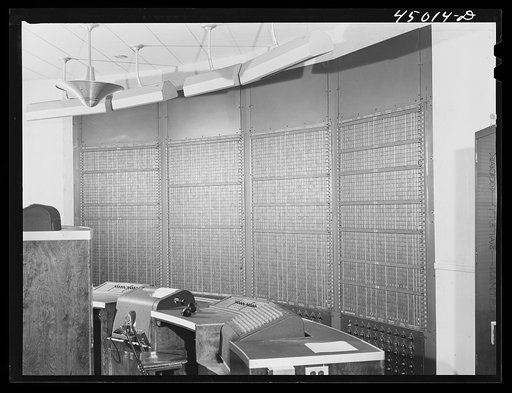 Untitled photo, possibly related to: A new electrical control board just installed to take the place of the old manual one. In the airport control room. Washington D.C. municipal airport