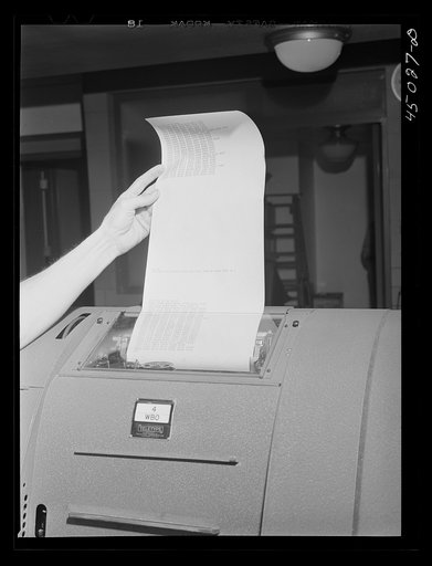 Weather data coming in on the teletype in the teletype room. Washington, D.C. municipal airport