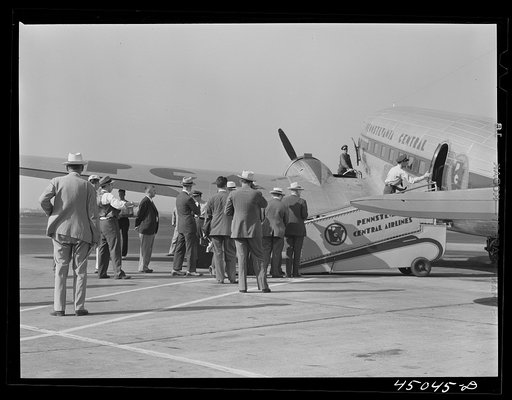 Passengers boarding an airliner. Municipal airport, Washington, D.C.