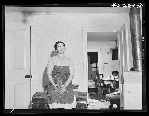 Mrs. Clifford House, whose husband has been a share-renter in the Pine Camp expansion area. The Houses are moving out of the area and being FSA (Farm Security Administration) borrowers, will receive additional FSA operation assistance in making a fresh start on their new farm. Watertown, New York