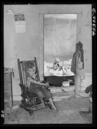 The three youngest children of Mr. and Mrs. Nelson Tousant. The Tousants are moving out of the Pine Camp expansion area after having lived there for seventeen years. New York