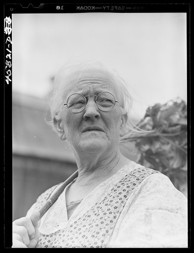 Mrs. Carrie E. Loadwick, lifelong resident of area being taken over by the Army, who is moving to the town of Adams. Leraysville, New York
