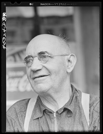 Untitled photo, possibly related to: Mr. Merton Hoover, postmaster, sixty-three years old, who loses his position through the wiping out of the town of Sterlingville, New York, in the Pine Camp expansion area. He is moving to West Carthage, New York