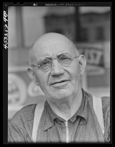 Mr. Merton Hoover, postmaster, sixty-three years old, who loses his position through the wiping out of the town of Sterlingville, New York, in the Pine Camp expansion area. He is moving to West Carthage, New York