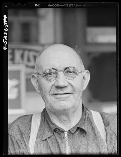 Untitled photo, possibly related to: Mr. Merton Hoover, postmaster, sixty-three years old, who loses his position through the wiping out of the town of Sterlingville, New York, in the Pine Camp expansion area. He is moving to West Carthage, New York