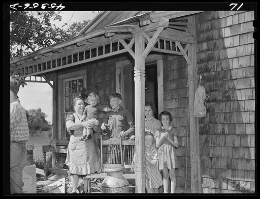 The family of Almond Drake on moving day. They are moving out of the Pine Camp expansion area to a new farm in Adams, New York