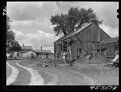 The farm of Dan Sampson, father of eleven children, in the Pine Camp expansion area. The family will be moved from this unproductive farm to one aquired by the New York Defense Relocation Corps in South Rutland, New York