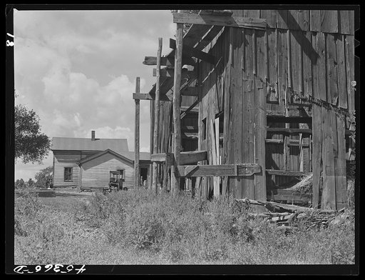 The farm of Dan Sampson, father of eleven children, in the Pine Camp expansion area. The family will be moved from this unproductive farm to the one acquired by the New York Defense Relocation Corps in South Rutland, New York