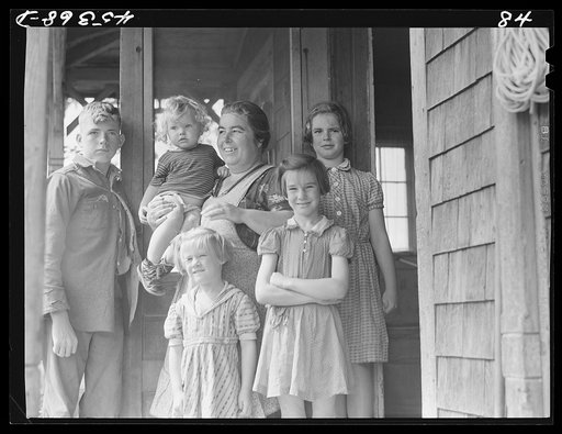 The family of Almond Drake, a farmer in the Pine Camp expansion area who must move out. Leraysville, New York