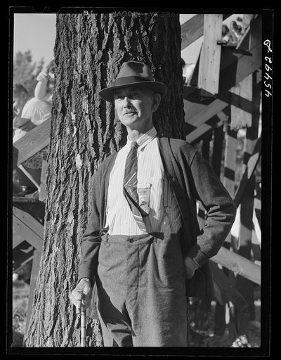 Untitled photo, possibly related to: A committee member of the fair in charge of auto parking. Rutland Fair, Vermont