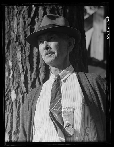 A committee member of the fair in charge of auto parking. Rutland Fair, Vermont