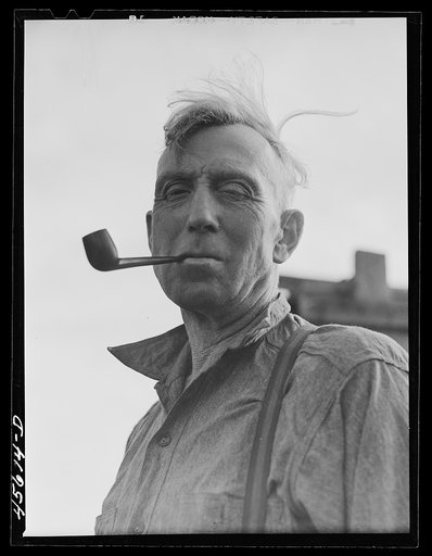 Untitled photo, possibly related to: Farmer and his wife who live on one of the hill farms east of Burlington, Vermont