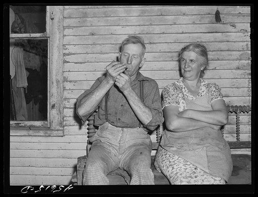 Farmer and his wife who live on one of the hill farms east of Burlington, Vermont