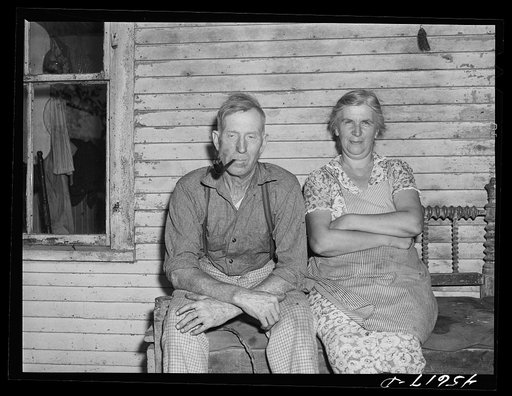 Untitled photo, possibly related to: Farmer and his wife who live on one of the hill farms east of Burlington, Vermont