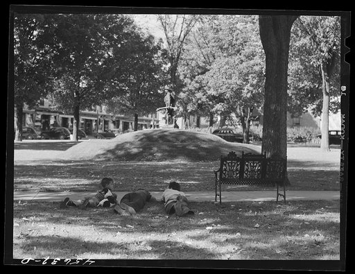 Untitled photo, possibly related to: Boys lounging in the square in Enosburg Falls, Vermont