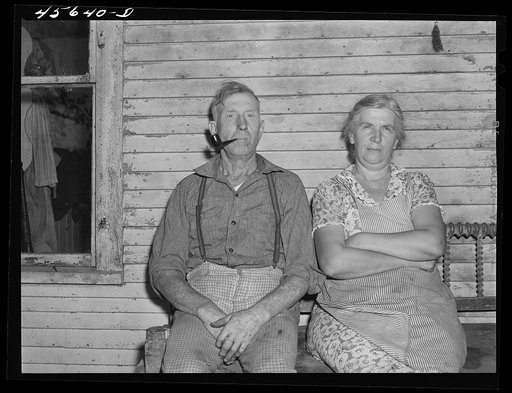 Untitled photo, possibly related to: Farmer and his wife who live on one of the hill farms east of Burlington, Vermont