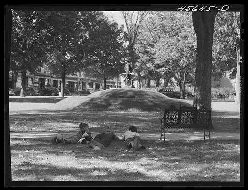 Boys lounging in the square in Enosburg Falls, Vermont