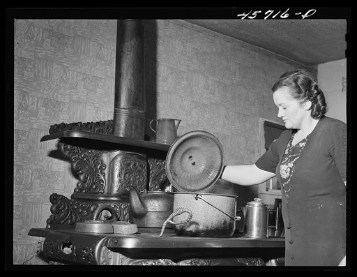 Mrs. W. Gaynor preparing dinner on their farm near Fairfield, Vermont