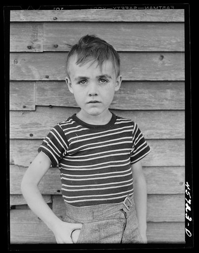 One of the Gaynor children on their farm near Fairfield, Vermont