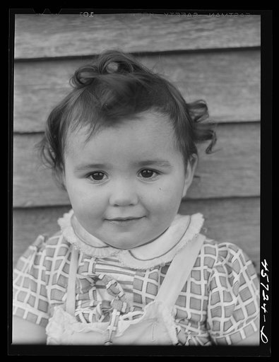 One of the Gaynor children on their farm near Fairfield, Vermont