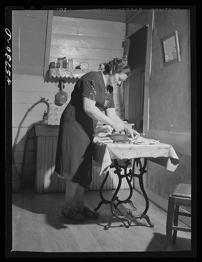 Mrs. Gaynor doing her ironing on their farm. Fairfield, Vermont