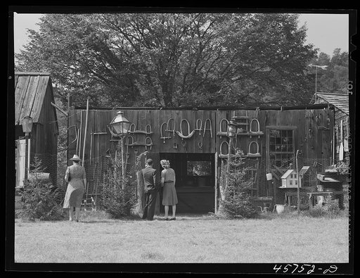 Visitors at the antique house at the World's Fair at Tunbridge, Vermont