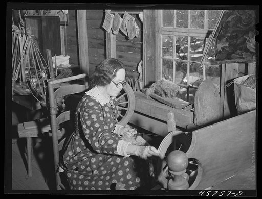Exhibit of spinning in the antique building at the World's Fair at Tunbridge, Vermont