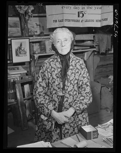 Mrs. Nellie Burroughs of Tunbridge selling pictures and souvenirs at the World's Fair, Vermont