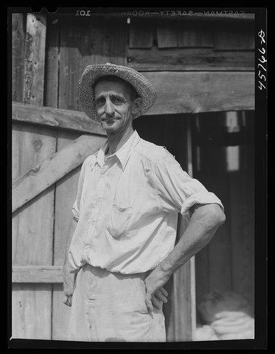 A Vermonter who was working at the old cider exhibit at the Tunbridge Fair. Tunbridge, Vermont