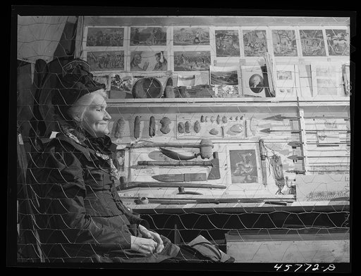 At one of the exhibits in the antique building in the World's Fair at Tunbridge, Vermont