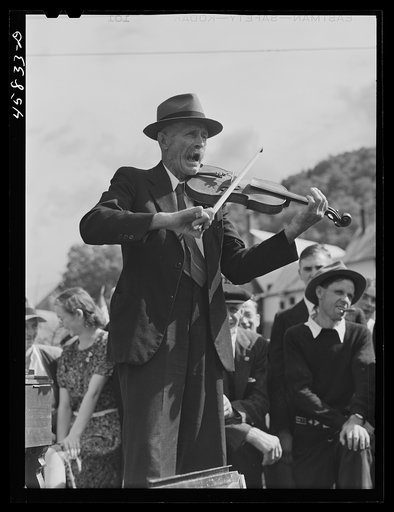 Untitled photo, possibly related to: Fiddler, Mr. Ed. Lorkin [i.e. Larkin] for the square dances at the World's Fair at Tunbridge, Vermont